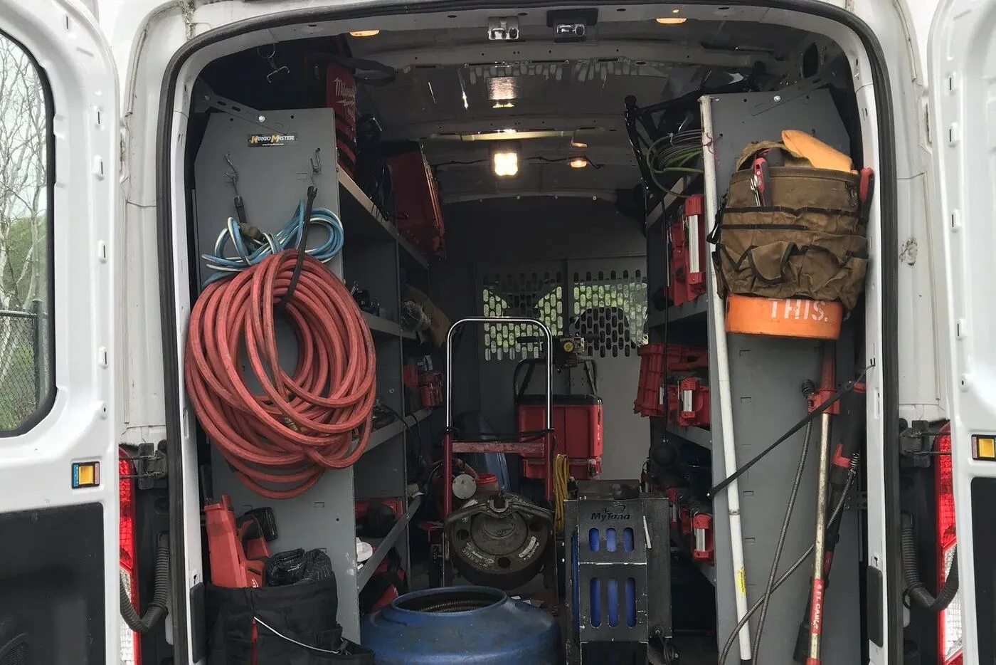 Maki Sewer and Drain service van with drain-cleaning hoses ready for residential drain cleaning in the Twin Cities